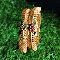 B0250_Lovely Trendy style Gold plated bangles with delicate craft work with a touch of ruby stones.