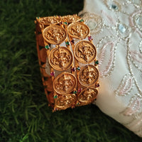 B0252_Lovely Ethnic style lakshmi design bangles with delicate work with a touch of green & pink ruby stones.