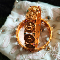 B0252_Lovely Ethnic style lakshmi design bangles with delicate work with a touch of green & pink ruby stones.