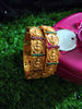 B0254_Lovely Ethnic style lakshmi design bangles with delicate work with a touch of green & pink ruby stones.