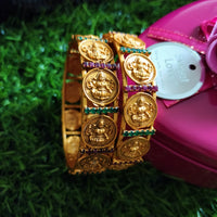 B0254_Lovely Ethnic style lakshmi design bangles with delicate work with a touch of green & pink ruby stones.