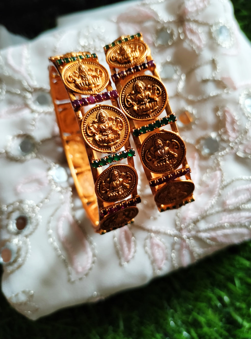 B0254_Lovely Ethnic style lakshmi design bangles with delicate work with a touch of green & pink ruby stones.