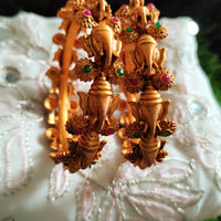 B0253_Gorgeous Ganesha design bangles with delicate work with a touch of green & pink ruby stones.
