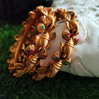 B0253_Gorgeous Ganesha design bangles with delicate work with a touch of green & pink ruby stones.