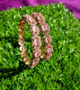 B0178_S_Elegant Rose Gold bangles embellished with American Diamond stones with a touch of dazzling pink stones.
