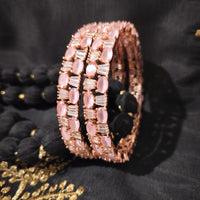 B0261_Elegant Rose Gold bangles embellished with American Diamond stones with a touch of dazzling pink stones.