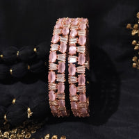 B0261_Elegant Rose Gold bangles embellished with American Diamond stones with a touch of dazzling pink stones.