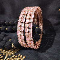 B0261_Elegant Rose Gold bangles embellished with American Diamond stones with a touch of dazzling pink stones.