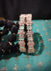 B0264_Lovely Rose Gold flower design American Diamond bangles with a touch of dazzling ocean green stones.