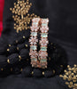 B0264_Lovely Rose Gold flower design American Diamond bangles with a touch of dazzling ocean green stones.
