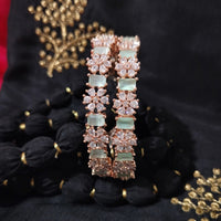 B0264_Lovely Rose Gold flower design American Diamond bangles with a touch of dazzling ocean green stones.