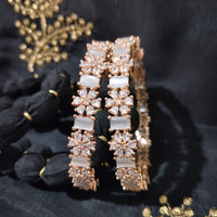 B0259__Elegant designer bangles with delicate designs studded with american diamond stones with a touch of ash color stones.