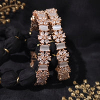 B0259__Elegant designer bangles with delicate designs studded with american diamond stones with a touch of ash color stones.