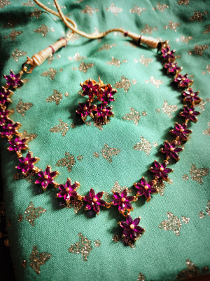 N0398_Elegant Gold plated Necklace with delicate design pendant studded with a touch of Precious ruby stones.