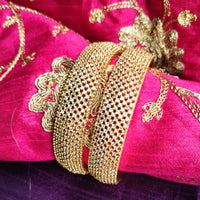 B0270_Classy broad Gold plated bangles studded with  delicate American Diamond  stones.