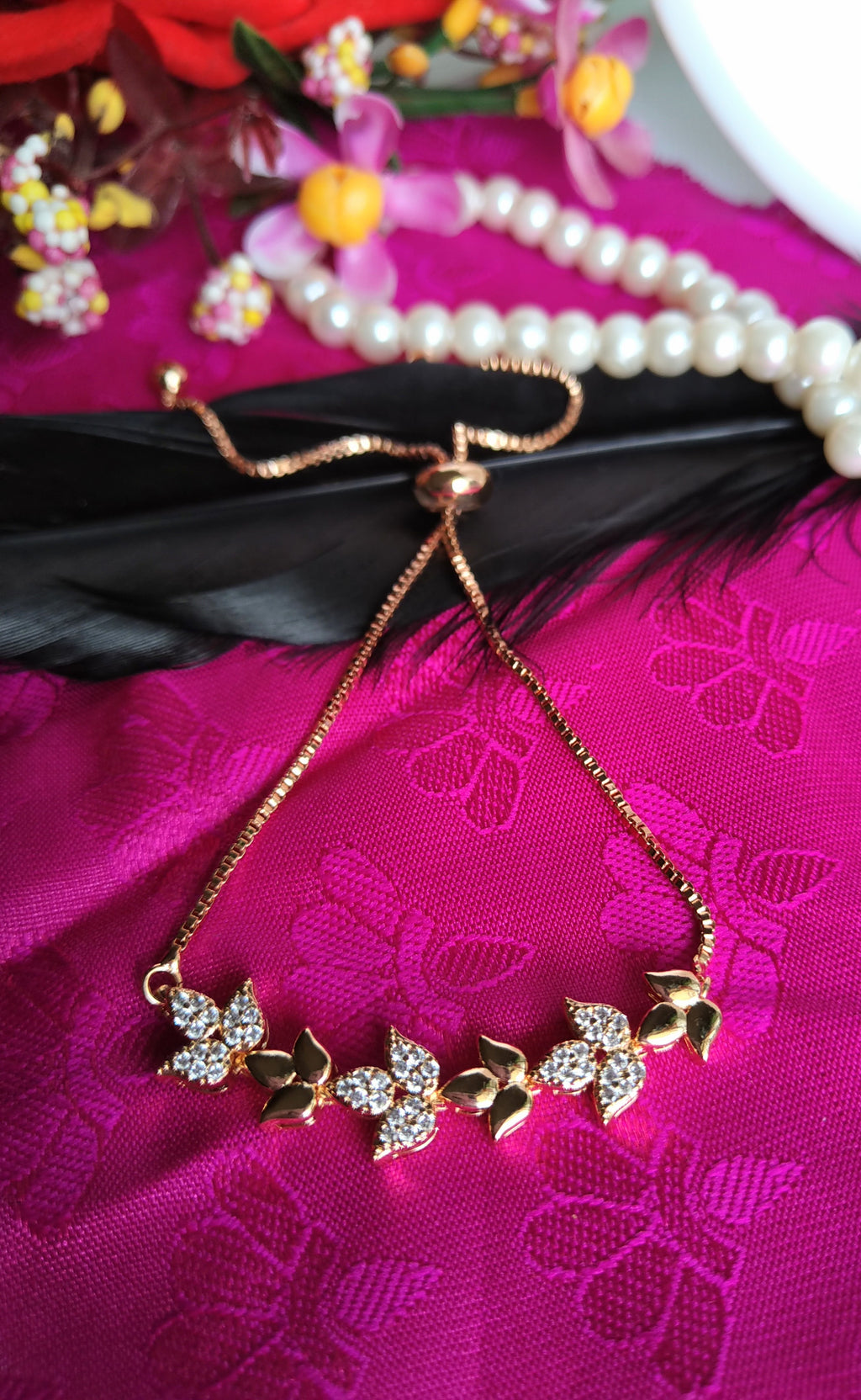 B0269_Lovely leafy design bracelets studded with delicate work of american diamond stones.