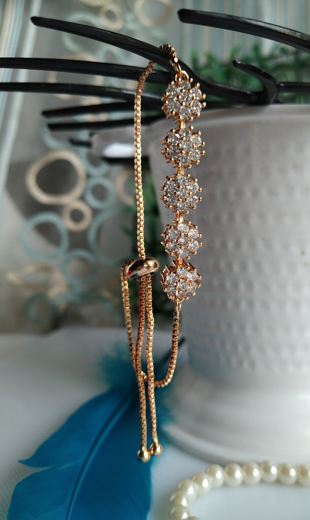 B0267_Lovely flower design bracelets studded with delicate work of american diamond stones.