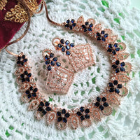 N0409_Gorgeous necklace embellished with american diamond stones with a touch of blue stones with delicate work.