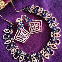N0409_Gorgeous necklace embellished with american diamond stones with a touch of blue stones with delicate work.