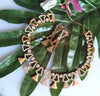 N0410_Classy golden necklace embellished with american diamond stones with delicate patterns.