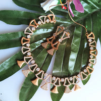 N0410_Classy golden necklace embellished with american diamond stones with delicate patterns.