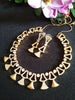 N0410_Classy golden necklace embellished with american diamond stones with delicate patterns.