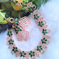 N0419_Elegant design american diamond embellished necklace with a touch of green  stones.