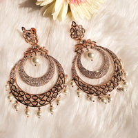 E0856_Classy designer Chandhbali style American Diamond studded danglers with beautiful art work with a touch of pearl drop.