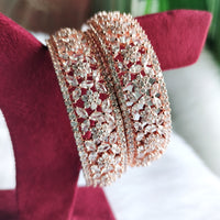 B0239_S_Ravishing Broad Rose gold bangle with delicate flower design embellished with American Diamond stones.
