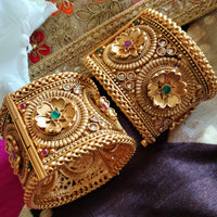 B0280_Lovely broad style Ethnic screw design bangles with delicate work of flower design  with a touch of ruby and american diamond stones.