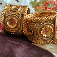 B0280_Lovely broad style Ethnic screw design bangles with delicate work of flower design  with a touch of ruby and american diamond stones.