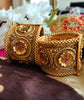 B0280_Lovely broad style Ethnic screw design bangles with delicate work of flower design  with a touch of ruby and american diamond stones.