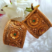 B0280_Lovely broad style Ethnic screw design bangles with delicate work of flower design  with a touch of ruby and american diamond stones.