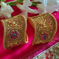 B0279_Lovely broad style Ethnic screw design bangles with delicate work with a touch of ruby and american diamond stones.