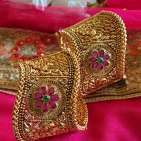B0279_Lovely broad style Ethnic screw design bangles with delicate work with a touch of ruby and american diamond stones.
