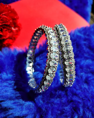 B052_ Classy Silver plated bangles studded with  American Diamond stones.