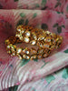 B0283_Classy Ethnic screw design bangles with delicate work of kundan stones.