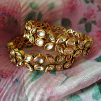 B0283_Classy Ethnic screw design bangles with delicate work of kundan stones.