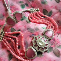 N0117_Classy  pink crystal choker necklace set with a over sized dazzling pendant studded  with  American diamond stones.
