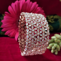 B0295_Ravishing Broad floral design rose gold  single Bangle studded with American Diamond stones with delicate stone work.