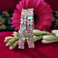 B0291_Lovely floral design Bangles studded with American Diamond stones with a touch of mint green stones.