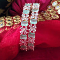 B0291_Lovely floral design Bangles studded with American Diamond stones with a touch of mint green stones.