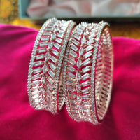 B0297_Gorgeous designer bangles studded with American Diamond stones with delicate stone work.