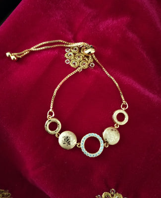 B0299_Classy circular design bracelets studded with  a touch of american diamond stones with delicate patterns.