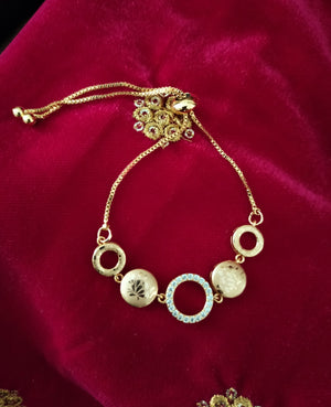 B0299_Classy circular design bracelets studded with  a touch of american diamond stones with delicate patterns.