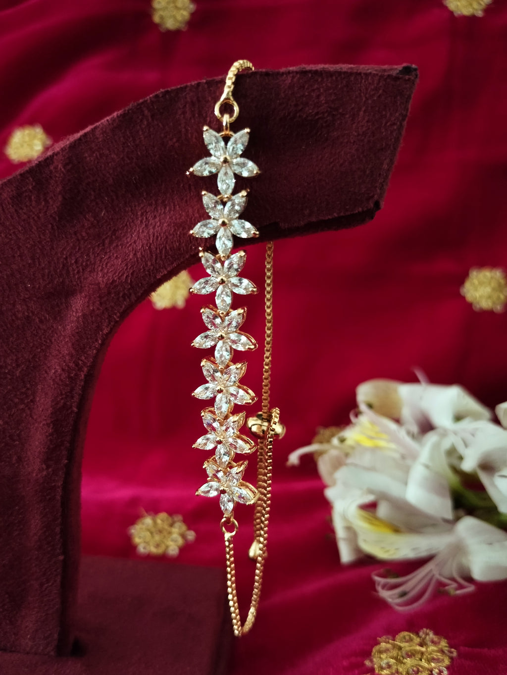 B0234_Lovely flower design bracelets studded with american diamond stones.