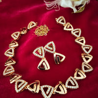 N0475_Classy golden necklace embellished with american diamond stones with delicate patterns.