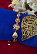 B0302_Lovely tear drop design bracelets studded with American diamond stones.