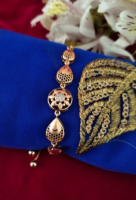B0302_Lovely tear drop design bracelets studded with American diamond stones.
