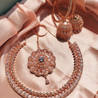 N0424_1_Gorgeous  designer rose gold american diamond embellished necklace set with a touch of  white stones.
